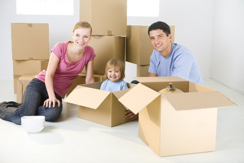 Same day removals team loading furniture in Redbridge