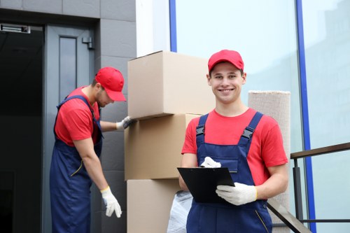 Student removals team helping with boxes and furniture in Redbridge
