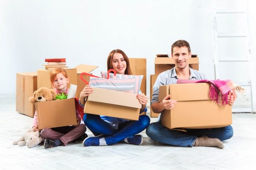 Packing boxes and organising belongings during a Redbridge house move