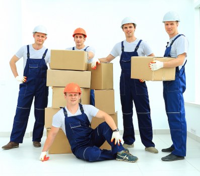 House removalists loading furniture for a home move in Redbridge