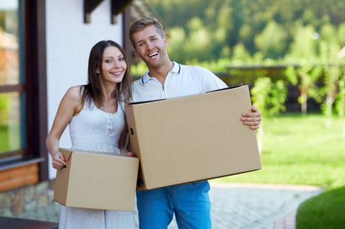 Packed boxes and furniture loaded into a moving van