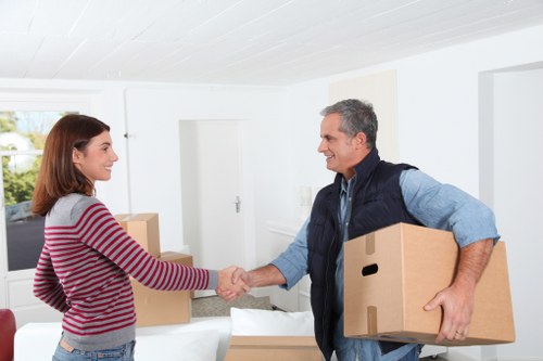 Office relocation support in Redbridge with furniture being moved