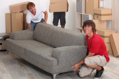 Removal van loading household items from a Redbridge property