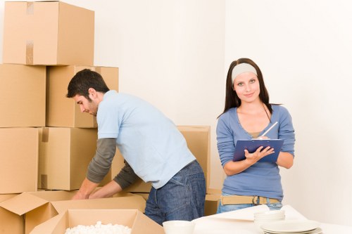 Careful loading of household furniture during a Redbridge removal
