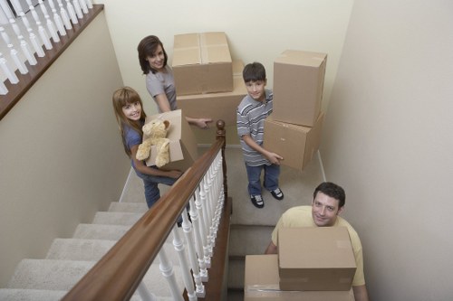 Loading office furniture for a business move in East London